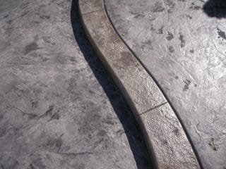 Béton imprimé bordure granit