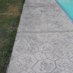Béton imprimé pierre opus zinc anthracite piscine