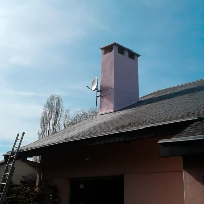 Souche de cheminée rénovée et enduite